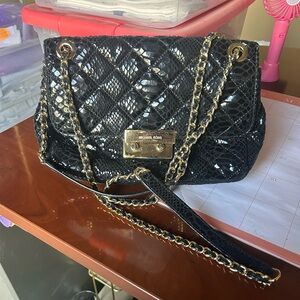 Michael kors black handbag, perfect for any occasion.